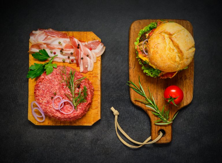 Minced Raw Meat and Bacon with Burger Sandwich on Top View